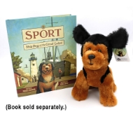 Sport plush dog next to sport book.