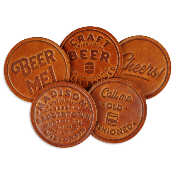 Five tan leather beer coasters with embossed text