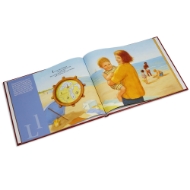 Open book page. L is for Lake Michigan with illustrated mother holding baby on yellow, sandy beach. Blue lake and other kids playing on the beach in background. 