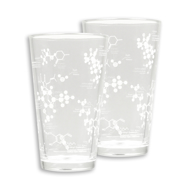 Two Science of Beer Pint glasses with white molecules scattered across the glasses. 
