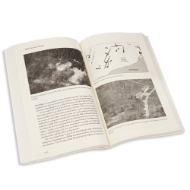 Inside view of the book "Spirits of the Earth" showing black and white photographs and illustrations.