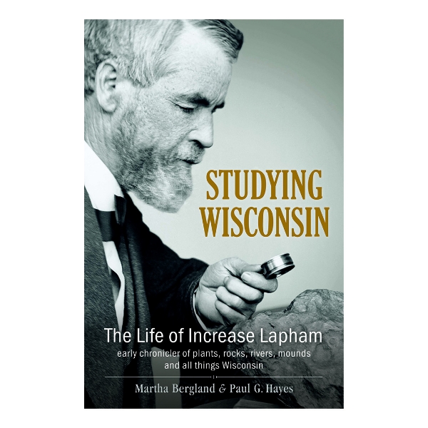 Book cover of "Studying Wisconsin" with a profile shot of Increase Lapham peering through a magnifying glass at a rock. 