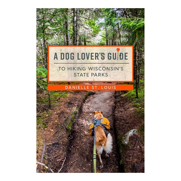 Book cover of "A Dog Lover's Guide to Hiking Wisconsin State Parks" showing a dog on a leash walking a wooded trail.