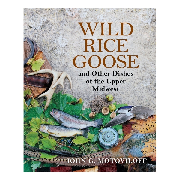 Book cover to "Wild Rice Goose" showing a picture of two freshly caught trout, a fishing reel, fowl feathers, antlers, and a trout fishing basket.