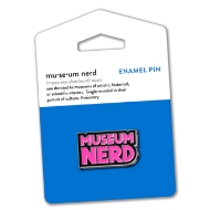 Museum Nerd pin with pink enamel text that says "Museum Nerd." The pin is mounted on blue display card.