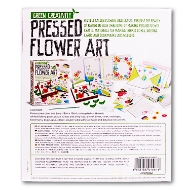 Back of box holding "Pressed Flower Art" kit. Colorful photo showing the cardboard flower press, little paper boxes, and note cards that can be used for crafting.