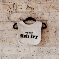 My first fish fry bib displayed hung up on a hangar. 