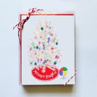 Merry & Bright Aluminum Christmas Tree Card boxed with red twine on corner holding card. 