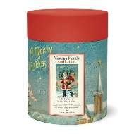 Back side of Santa Claus puzzle cylinder showing image of completed puzzle with information about packaging. 