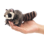Small raccoon finger puppet with fuzzy gray fur and striped tail. Shown in use, cradled in hand. 