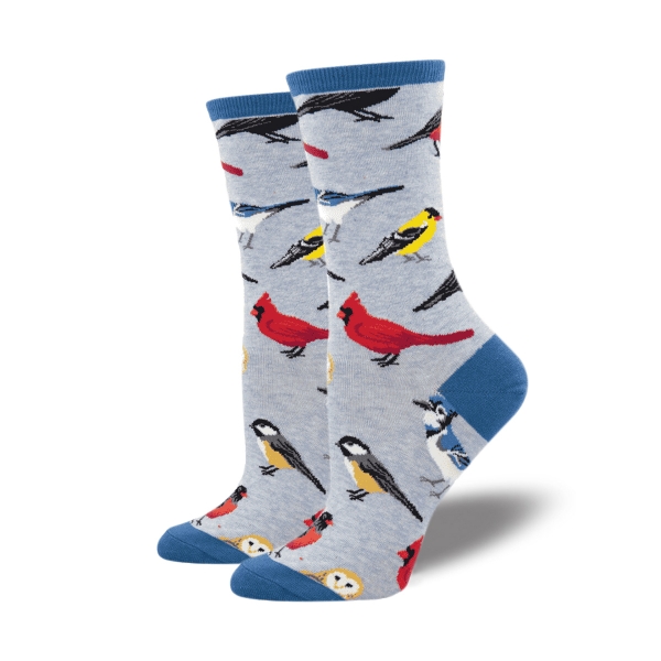 Bird is the Word sock in grey featuring Featuring cardinals, blue jays, robins, chickadees, & owls. Top rim, heel, and toe are blue. 