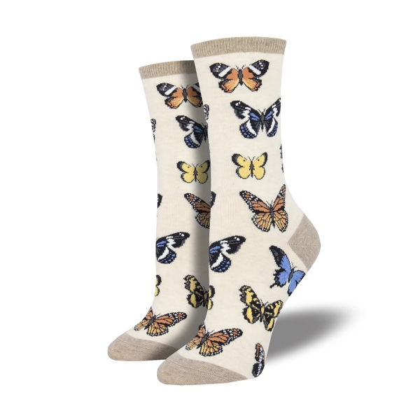 Majestic Butterflies sock in tan featuring different colored butterflies. Orange, blue, and yellow butterflies. Top edge, heel, and toe are light brown.