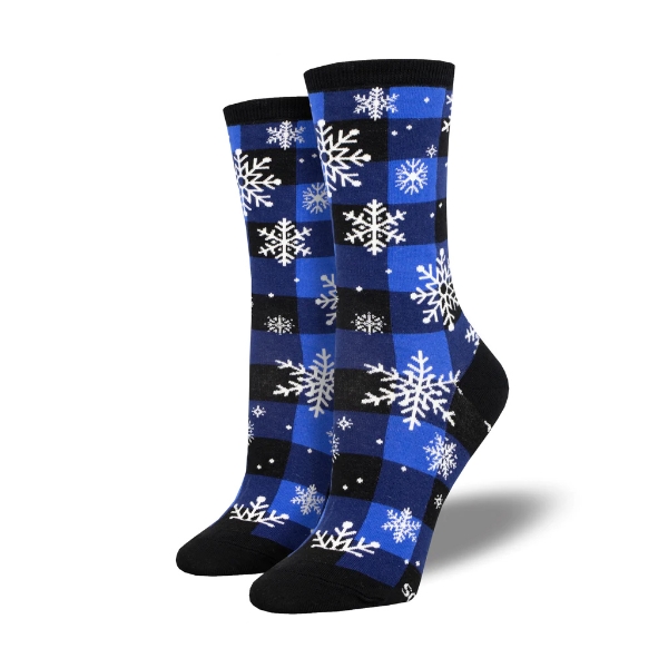 Snowflakes sock in black and blue plad checkered pattern and white snowflakes of different designs and sizes. Top edge, heel, and toe are black. 