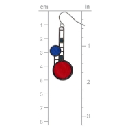 Polished brass dangle earring with asymetrical design featuring lower, larger red circle and smaller blue circle above. Shown next to ruler marking  approx 2" total length.