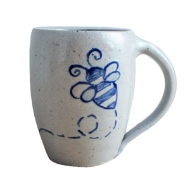 Gray stoneware coffee mug with blue line-drawing design of bumble bee in flight.