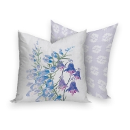 Square decorator pillow with viloet wildflower design on one side (white background) and white whildflower motif on reverse (violet background)