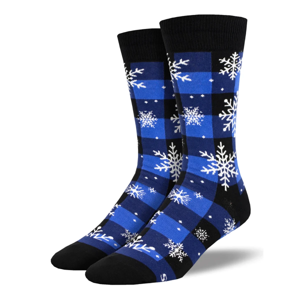 Two blue and black plaid socks with white snowflake motif.