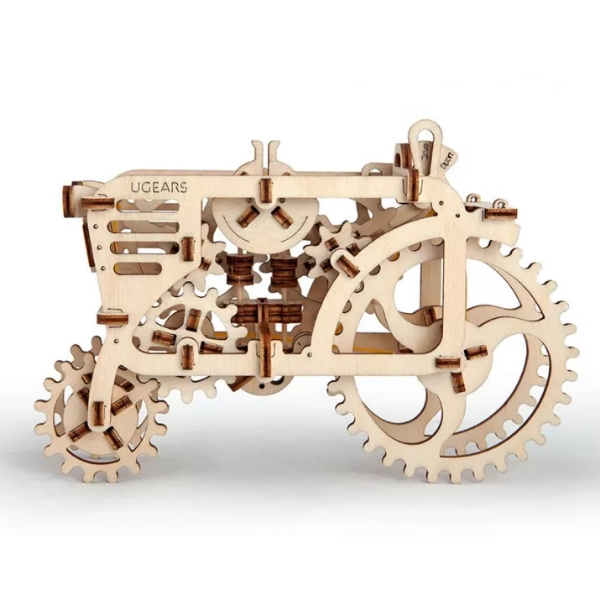 Unpainted, wooden model of a tractor with small, laser cut wooden parts. Made by Ugears.
