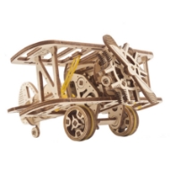 Small wooden model of a biplane, assembled, made of wooden parts that were laser cut from thin wood. 