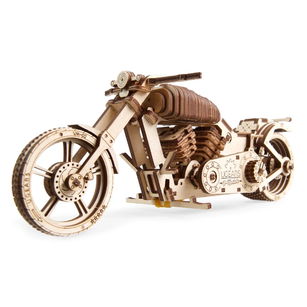 Side view of small wooden motorcycle model kit by UGears; assembled.