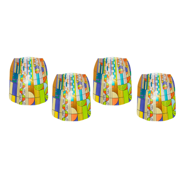Four home decor luminaries with multicolored "Saguaro Forms" design by Frank Lloyd Wright. White background.