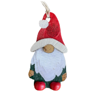 Holiday tree ornament representing a gnome figure. Carved from gourd and hand painted red hat, white beard, and red shoes. 