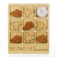 Wooden tic-tac-toe board with wooden game pieces in the shapes of cow faces and cheese wedges. On the bottom of the board, the words "Tic-Tac-Wisconsin" are etched into the board.