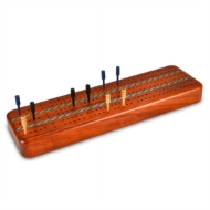 Rectangular padauk wood cribbage board with three player tracks. Pegs inserted for scale. 