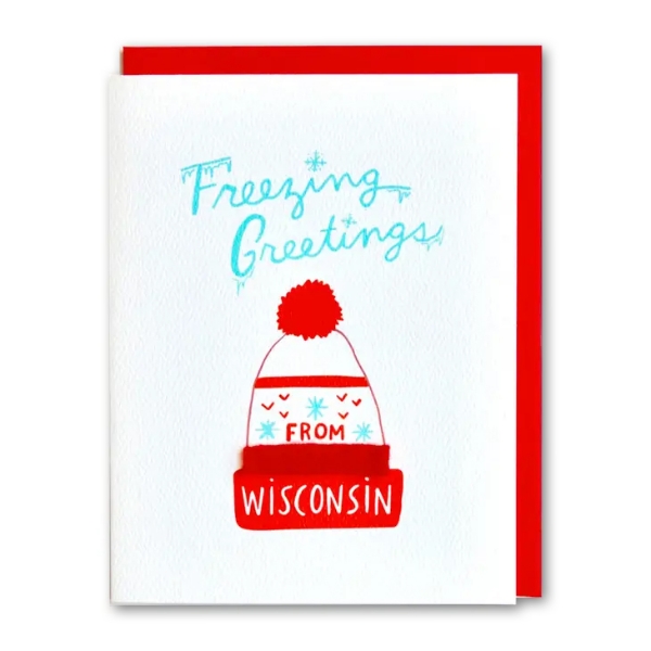 White greeting card with illustration of red knit cap and the words "Freezing greetings from Wisconsin." Red envelope.