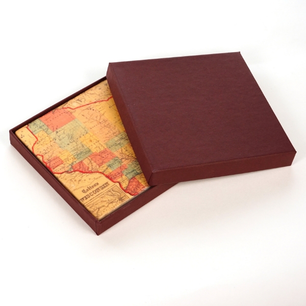 Square marble coaster with color image of historic map of Wisconsin printed on it. The coaster is in a maroon box with cover partly removed.