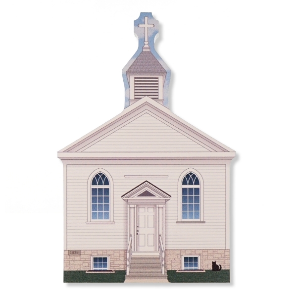 Facade of historic St. Peter's Catholic white church as it appears on the miniature home decor piece. Two arched windows, left and right of the entrance, and a steeple atop.