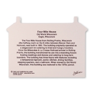 Product photo of the back side of the miniature wood cutout of Old World Wisconsin's Four Mile House with a short history of the inn dating to 1853.