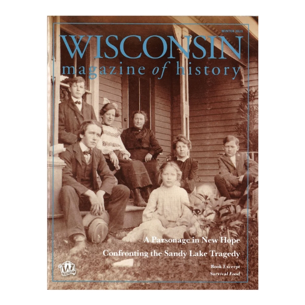 Cover of Wisconsin Magazine of History Winter 2023 with sepia photo dated 1904 of the Farseth family sitting around front steps or porch of house. 