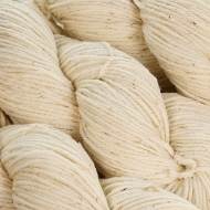 Close up of a bundle of, off-white, wool yarn showing the texture of the yarn. 
