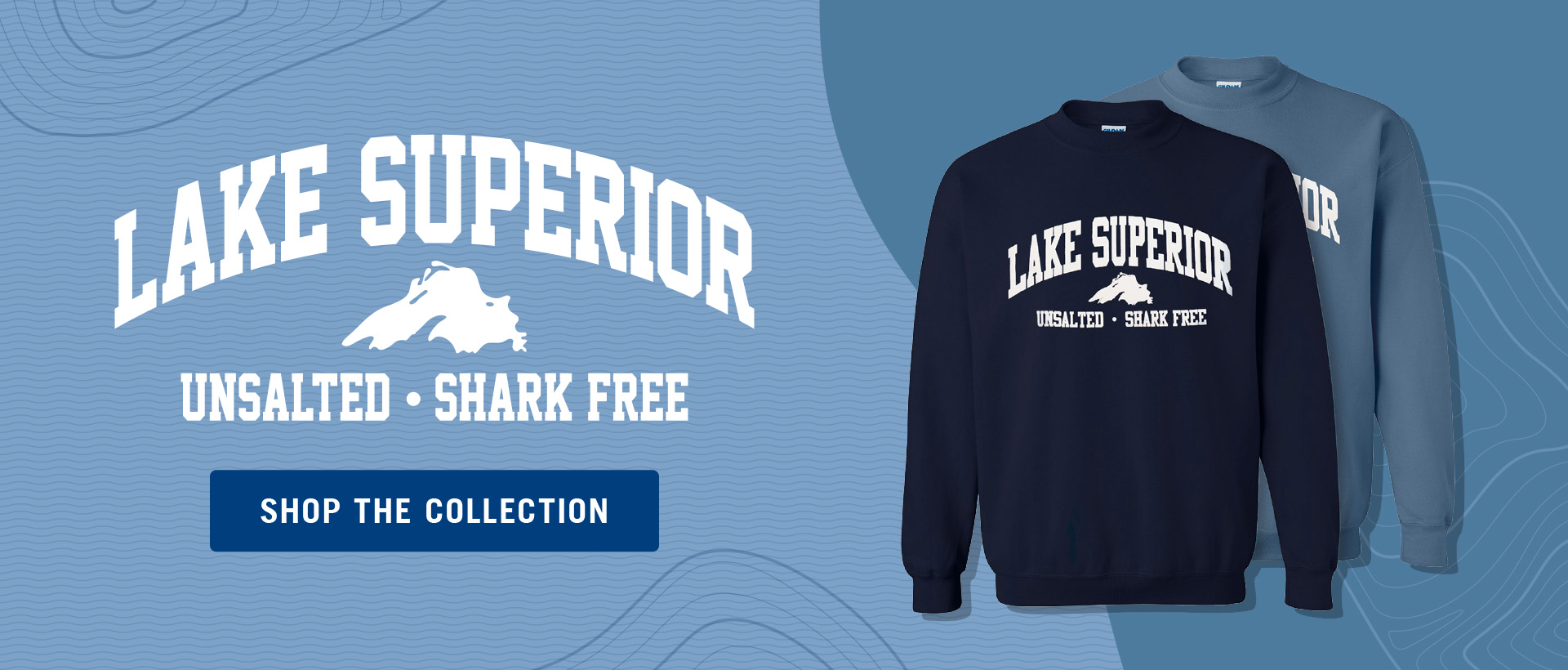 Two sweatshirts, light blue and dark blue, that say "Lake Superior" in bold white font. Light blue background.