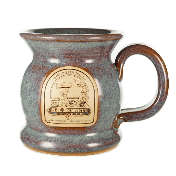 Gray-blue mug with tan HH Bennett Wisconsin Dells logo application on side.