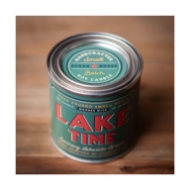 "Lake Time" candle packaged in looking tin can with greenish retro style label with bold red font. 