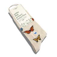 Two tan socks with colorful butterfly motif, shown folded with product display card. 
