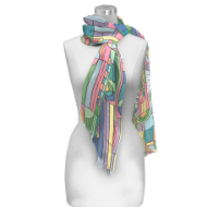 Multicolor sheer scarf tied around white mannequin form. The scarf features the geometric "Saguaro Forms" design by Frank Lloyd Wright. 