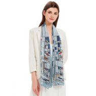 Brunette model wearing sheer polyester scarf, light blue. The scarf has "Waterlilies" design by Frank Lloyd Wright.
