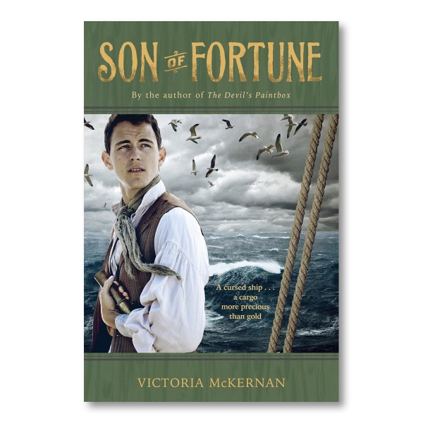 "SON OF FORTUNE" written in gold over a green background. Underneath is an image of a young man at sea looking off into the distance. Next to him is "A cursed ship . . . a cargo more precious than gold," is written in white.