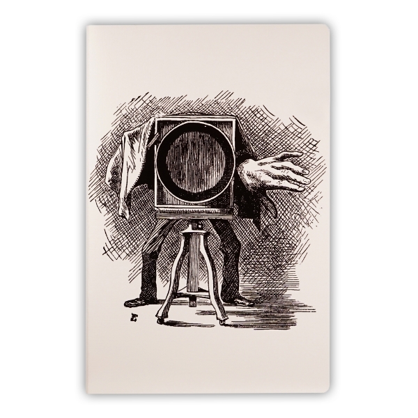 The cover of the sketchbook with the picture of the Lewis Carroll camera picture