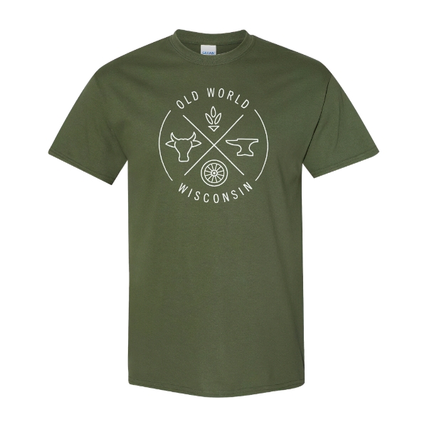 Green shirt with white line-art design representing themes of Old World Wisconsin: an ox, an anvil, a wheel, and wheat.