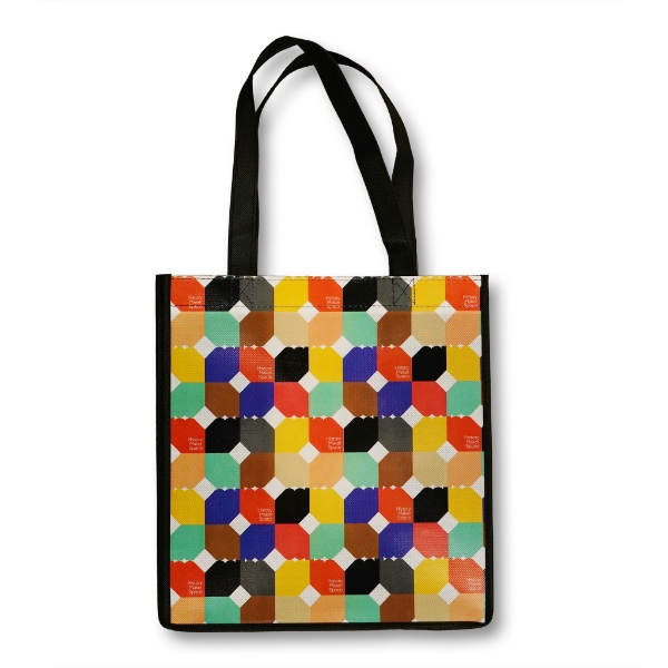 History Maker Space tote bag with multicolor geometric pattern.