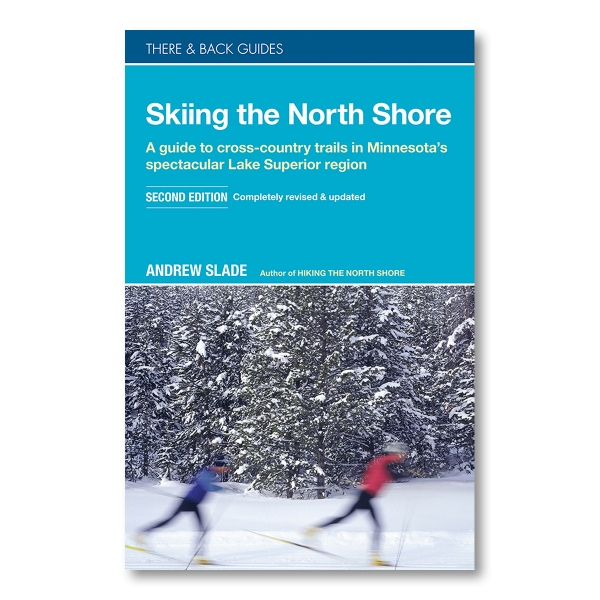 Cover of "Skiing the North Shore" with the title written in white above a picture of two people skiing 