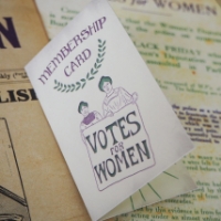 The front of the packaging for the "Votes for Women" Ribbon Enamel Pin