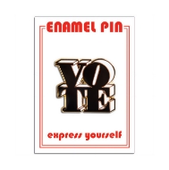 One enamel lapel pin with the word VOTE in bold, black font.