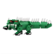 Hodag model made from green interlocking bricks. Black feet and white spikes along the back.