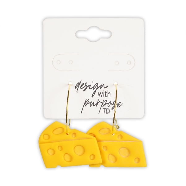 Two "Cheesehead" hoop earrings hanging on white display card.