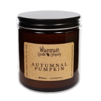 The Autumnal Pumpkin 16 oz candle  in brown glass container with black tin screw top.